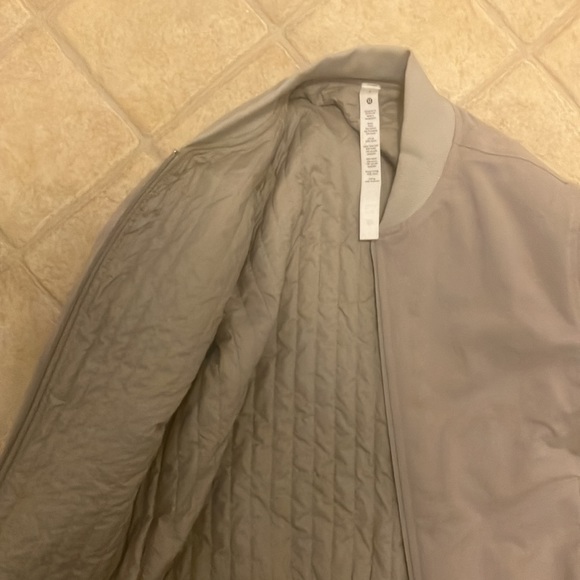 Lululemon bomber jacket size 4. Nylon lining inside. Beige color. - Picture 2 of 3